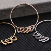 Bangle Bracelet with Heart Shape Pendants